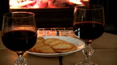 Wine and food by the fire; 2