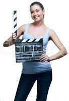 Attractive young woman with movie clapper