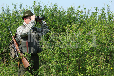 hunter with binoculars