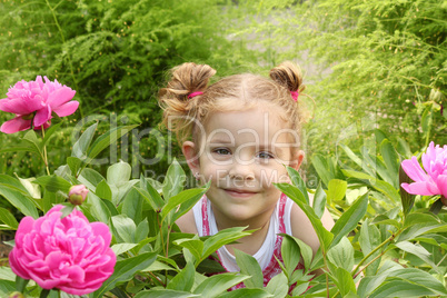 little girl in garden