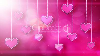 shiny hearts dangling on strings love loop background