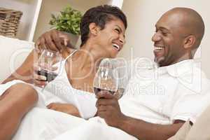 Happy African American Man & Woman Couple Drinking Wine