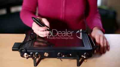 Woman Working With Robust Engineer GPS Tablet PC