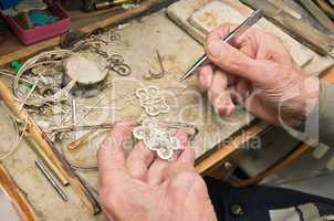 hands of  jeweller