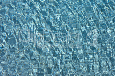 beautiful clear pool water reflecting in the sun