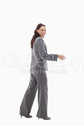 Businesswoman smiling and shaking hands