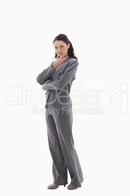 Profile of businesswoman with the hand on her chin