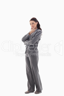 Profile of a businesswoman with the hand on her chin