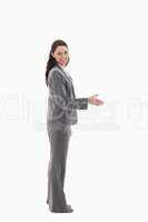 Profile of businesswoman smiling and shaking hands
