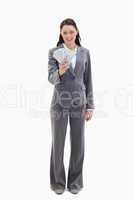Businesswoman holding a lot of dollar bank notes