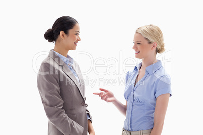 Two women talking happily