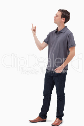 Man standing and presenting something above