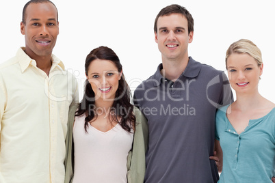 Close-up of two couples smiling