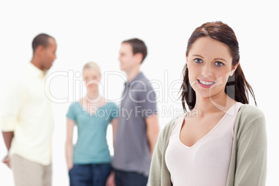 Close-up of a woman smiling with friends