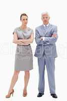 White hair man posing with woman crossing their arms