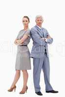 Serious white hair businessman back to back with a woman