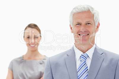 Close-up of a happy white hair businessman with a woman smiling
