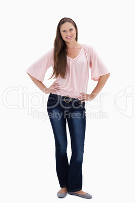 Woman smiling with her hands on her hips