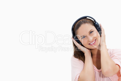 Smiling girl wearing headphones