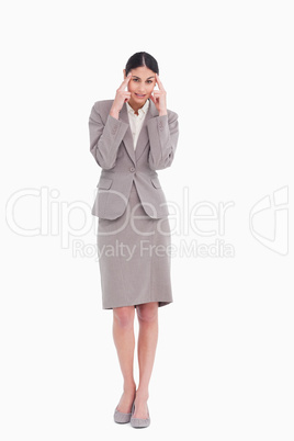 Businesswoman rubbing her temples