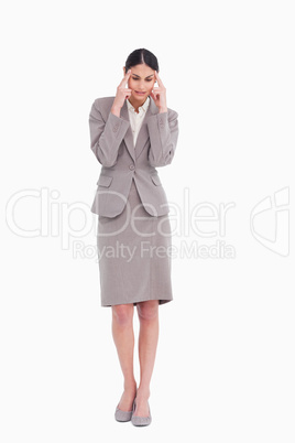 Businesswoman experiencing a headache