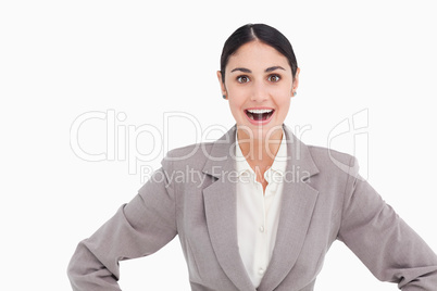 Young businesswoman looking positive surprised