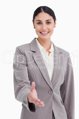 Smiling businesswoman offering her hand