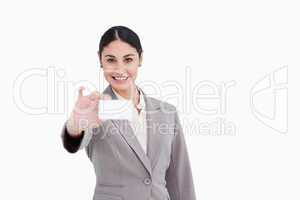 Smiling saleswoman presenting her business card