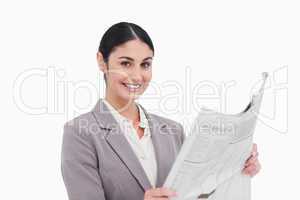 Smiling businesswoman with news paper