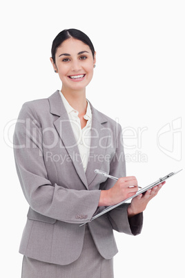 Smiling businesswoman ready to take notes