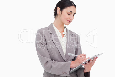 Businesswoman taking notes