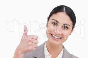 Close up of businesswoman giving thumb up
