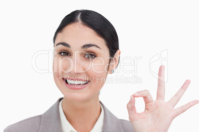 Close up of smiling businesswoman giving her approval
