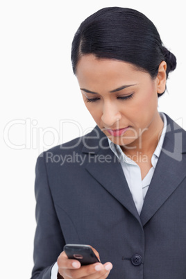 Close up of saleswoman reading text message