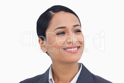 Close up of smiling saleswoman looking to the side