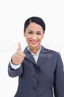Close up of smiling saleswoman giving thumb up