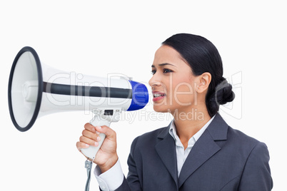 Close up of saleswoman using megaphone
