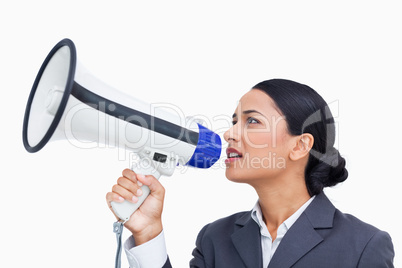 Close up side view of saleswoman using megaphone