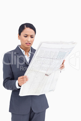 Close up of saleswoman reading the news