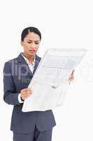 Close up of saleswoman reading the news