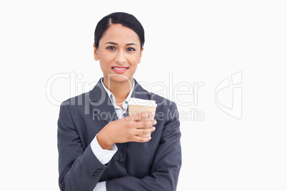 Close up of smiling saleswoman with paper cup Close up of smiling saleswoman with paper cup