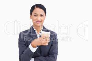 Close up of smiling saleswoman with paper cup