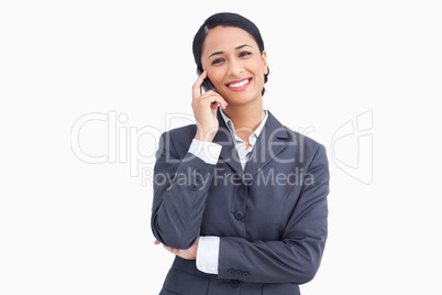 Close up of saleswoman on her mobile phone