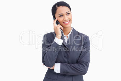 Close up of smiling saleswoman in telephone conversation