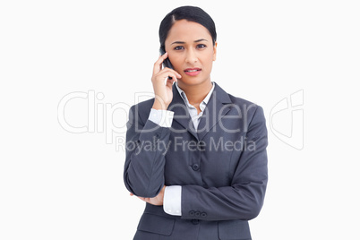 Close up of saleswoman in phone conversation