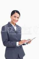 Close up of saleswoman with pen and clipboard