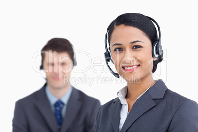 Close up of smiling call center agents