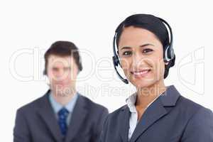 Close up of smiling call center agents