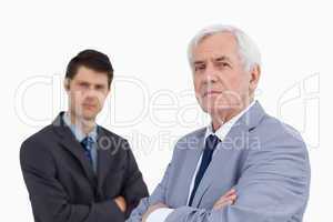 Close up of businessmen with arms folded