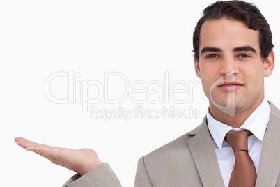 Close up of salesman holding palm up